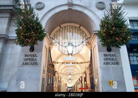 Christmas Decorations Retail Shopping Shops Arcade Royal Opera Arcade, St James's, London SW1Y 4UY Designed By John Nash Royal Opera House Stock Photo