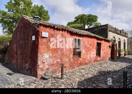 Old warehouse on corner of cobbled street in Colonia del Sacramento, Uruguay. Stock Photo