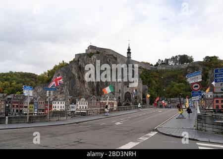 Dinant/Belgium - October 10 2019: Beautiful city Dinant with church and bridge and famous for sax Stock Photo