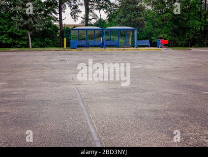 The parking lot and bus stop at Bel Air Mall are deserted during the COVID-19 pandemic, March 29, 2020, in Mobile, Alabama. Stock Photo