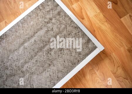 Detail of old used dirty furnace filter from above Stock Photo