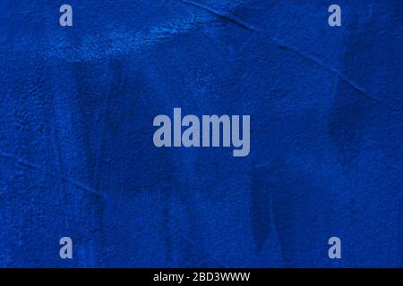 Abstract background from dark blue concrete texture wall. Vintage and retro backdrop. Stock Photo