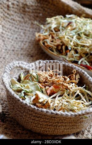 High view dried vegetables in basket, ingredient for many Vietnamese dishes, make dry from carrot, kohlrabi, radish Stock Photo