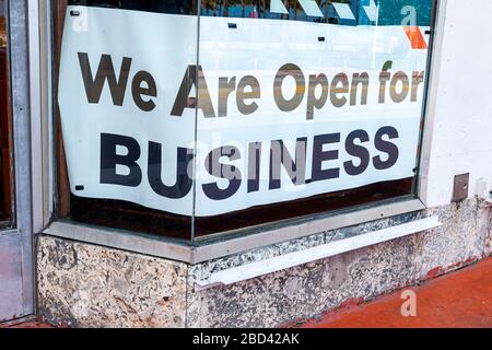 Miami Beach Florida,South Beach,TGI Fridays,restaurant restaurants food dining eating out cafe cafes bistro,large sign window,we are open for business Stock Photo