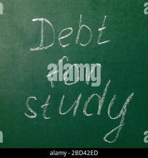 School board with text. Concept on Study Debt Stock Photo