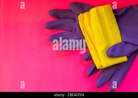 House cleaning products on white table with blue gradient backdrop. Lots of copy space around objects. Stock Photo