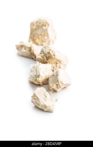 Fresh yeast blocks isolated on white background. Stock Photo