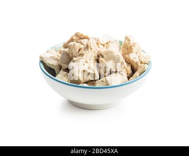 Fresh yeast blocks isolated on white background. Stock Photo