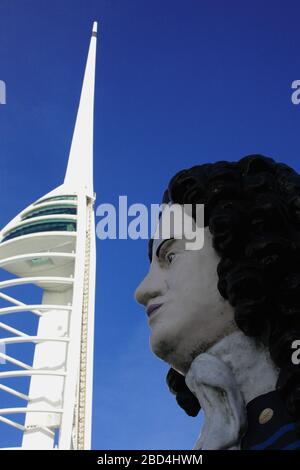 A large figurehead from HMS Marlborough (launched 1855) and representing John Churchill, Duke of Marlborough, stares at Spinnaker Tower, Gunwharf Quays, Portsmouth, Hampshire, England, UK Stock Photo