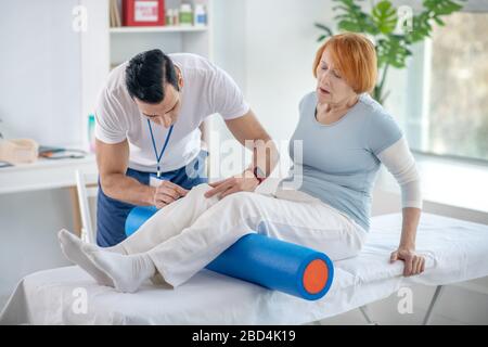 Nice senior woman having her treatment session Stock Photo