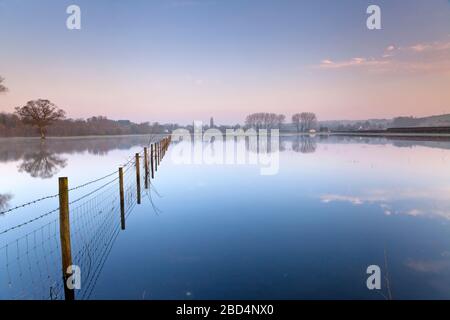 Flooded meadows near the village of South Newton in Wiltshire. Stock Photo