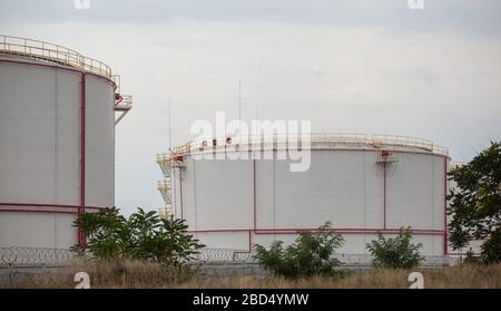 Large, industrial tanks for petroleum products. Close-up Stock Photo