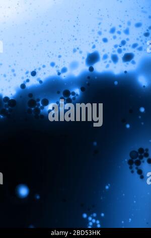 abstract background with streaks and spots in blue, place for text Stock Photo