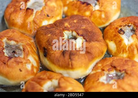 Meat pies. The traditional Kazakh, Tatar and Bashkir food - belyashi. Stock Photo
