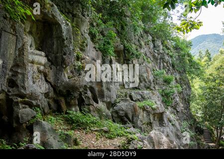 rock-cut sculpture, Felai Feng grottoes, Lingyin Temple, West Lake, Hangzhou, Chins Stock Photo