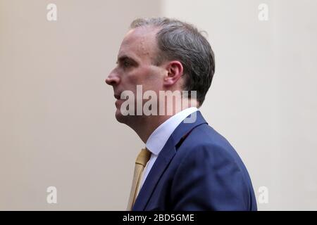 London, UK. 07th Apr, 2020. British Foreign Secretary Dominic Raab leaves 10 Downing street after the COVID-19 committee meeting in London, Britain, April 7, 2020. British Prime Minister Boris Johnson was taken to intensive care on Monday night after his coronavirus symptoms worsened, Downing Street said.    Johnson has asked British Foreign Secretary Dominic Raab to deputize for him, a Downing Street spokesman said. Credit: Xinhua/Alamy Live News Stock Photo