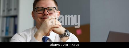 Cheerful man in presentable suit Stock Photo