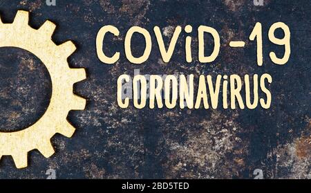 Coronavirus, covid-19 pandemic quarantine concept, shape symbol and text word on rusty metal background, banner Stock Photo