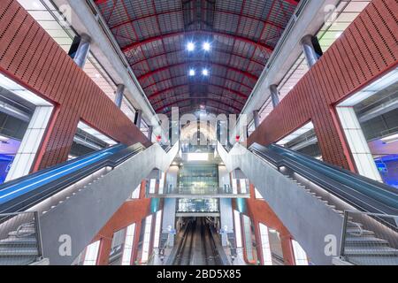 ANTWERP, BELGIUM - MARCH 5, 2020: Antwerpen-Centraal Railway Station escalators and platforms. The station dates from 1905.