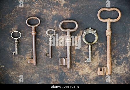 Group of antique keys, teamwork, cooperation concept Stock Photo