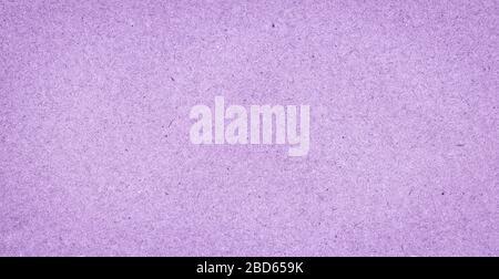 Texture of light lilac rough paper with fibers. Eco-recycled kraft paper. Cardboard background. Stock Photo