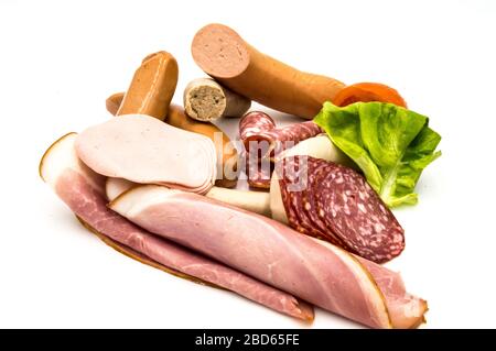 Assortment of delicious cold meats on a white background Stock Photo