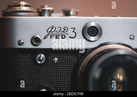 Bucharest, Romania - April 7, 2020: Details and shallow depth of field image (selective focus) with the F3 Ukrainian rangefinder vintage photo camera. Stock Photo