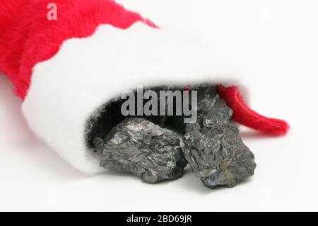 Coal in stocking Stock Photo