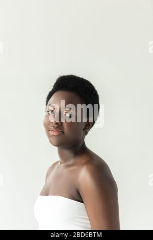 Attractive girl in white underwear. All on white background Stock Photo -  Alamy