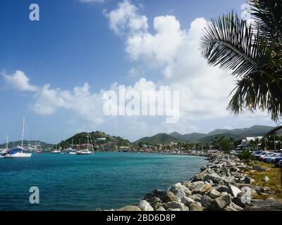 Marigot, Saint Martin, France - March 2015 - view of the Bay with yachts on the Turquoise water and buildings in background Stock Photo