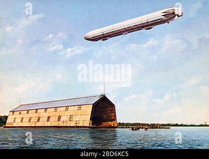 1908 German photo postcard of LZ 4 Zeppelin in flight over lake