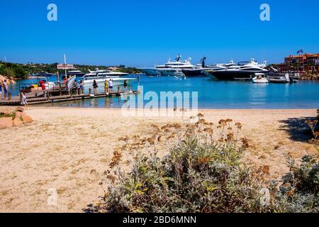 Porto Cervo, Sardinia / Italy - 2019/07/20: Panoramic view of luxury yacht port and marina of Porto Cervo resort at the Costa Smeralda coast Stock Photo