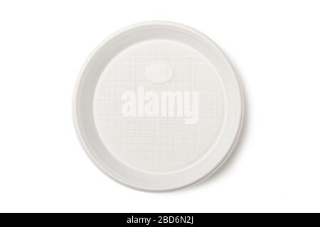 Disposable white plastic plate isolated on white background Stock Photo