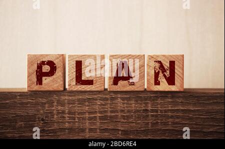 Plan word on wooden blocks on woode table. Business strategy concept Stock Photo