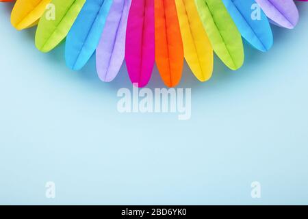 Colorful birthday party decoration on blue. Top view. Stock Photo