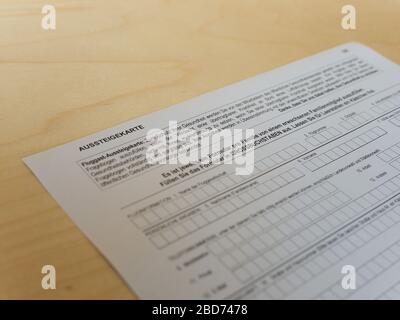 BERLIN, GERMANY - CIRCA MARCH 2020: Fluggast Aussteigekarte (translation:  Passenger Locator Form) Stock Photo