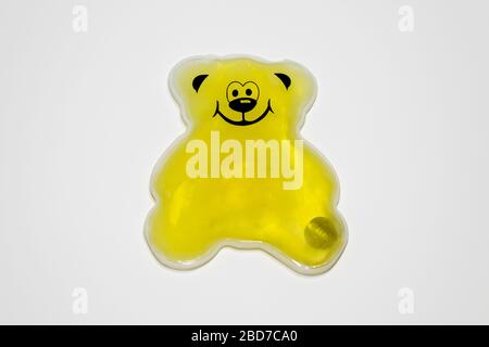 Yellow bear hot pack gel isolated on white background Stock Photo