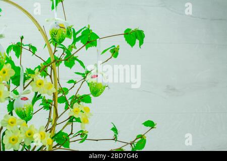Green tree branch with Easter eggs Stock Photo
