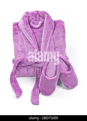 Folded bathrobe, and slippers isolated on white, top view. Stock Photo