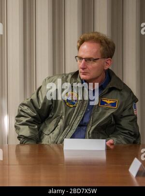 NORFOLK (Dec. 13, 2017) Undersecretary of the Navy, the Honorable Thomas B. Modly, right, listens as Rear Adm. Jeff Hughes, Commander, Expeditionary Strike Group 2. Hughes talked about flight and rescue experiences in the wake of hurricanes Harvey, Irma and Maria which devastated the U.S., Puerto Rico and the Virgin Islands this past summer. The Undersecretary of the Navy visited the Sailors of Helicopter Sea Combat (HSC) 7 to thank them for their humanitarian assistance/disaster relief efforts during the 2017 hurricane season. Stock Photo