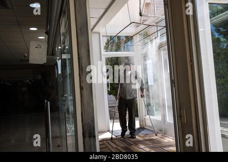 Douris, Lebanon, 7 April 2020. People enter Dar Al Amal University Hospital through a specially constructed corridor filled with misted disinfectant. Credit: Elizabeth Fitt/Alamy Live News Stock Photo