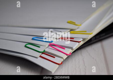File folder and Stack of business report paper file isolated on office desk. File document concept Stock Photo