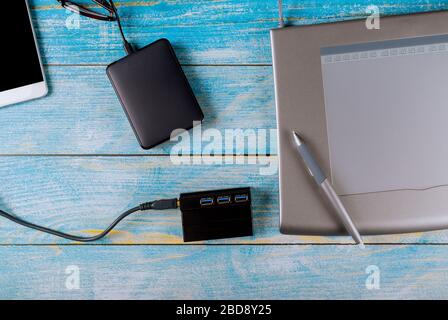 Designer working on laptop in office and graphic tablet designer office table Stock Photo