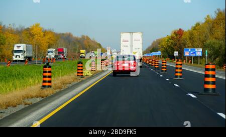 Ontario, Canada - October 28, 2019 - The view of the slow traffic around the construction area on Route 401 highway Stock Photo