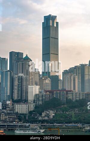 Chongqing, China - Dec 22, 2019: CBD Skyscrapers near Hongya dong cave by Jialing river Stock Photo