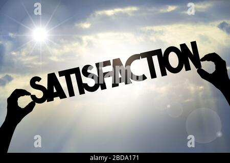 Satisfaction concept - hands, text, sky Stock Photo