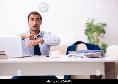Young employee working from house Stock Photo