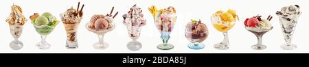 An assortment of ice-cream sundaes on a white background with copy space. Stock Photo