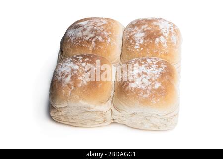 Wheat  bread rolls with ears isolated on white Stock Photo