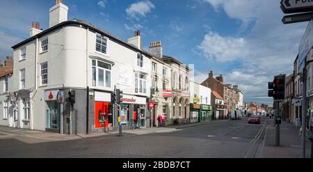 Shops and banks lining Market Place in Driffield, the centre of this East Yorkshire town Stock Photo